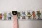 Preview: Webband, Robotor auf beigem Hintergrund, 25 mm, Farben: beige, hellblau, olive, rot