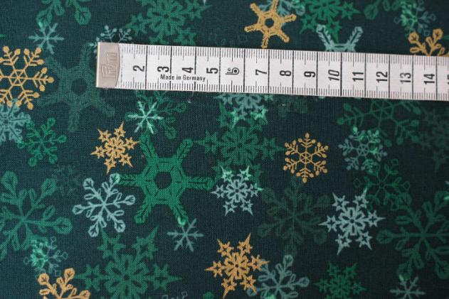 Preview: tannengrüner Weihnachtsstoff von Robert Kaufmann,Motiv Sterne, Farben: tannengrün-gold-weiß-grün